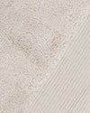 A close-up image of the ONSEN Oatmeal Plush Towel.
