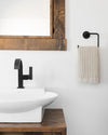The ONSEN Oatmeal Waffle Hand Towel in a bathroom setting.