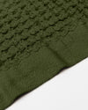 A close-up image of the ONSEN Forest Waffle Towel on a white background.