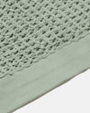 Close up Sage Waffle towel on a White Background.