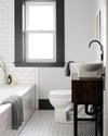 The ONSEN Cinder Grey Waffle Bath Sheet in a bathroom setting.