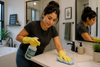 A woman cleaning  the bathroom.