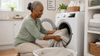 A grandmother washing the bath mats.
