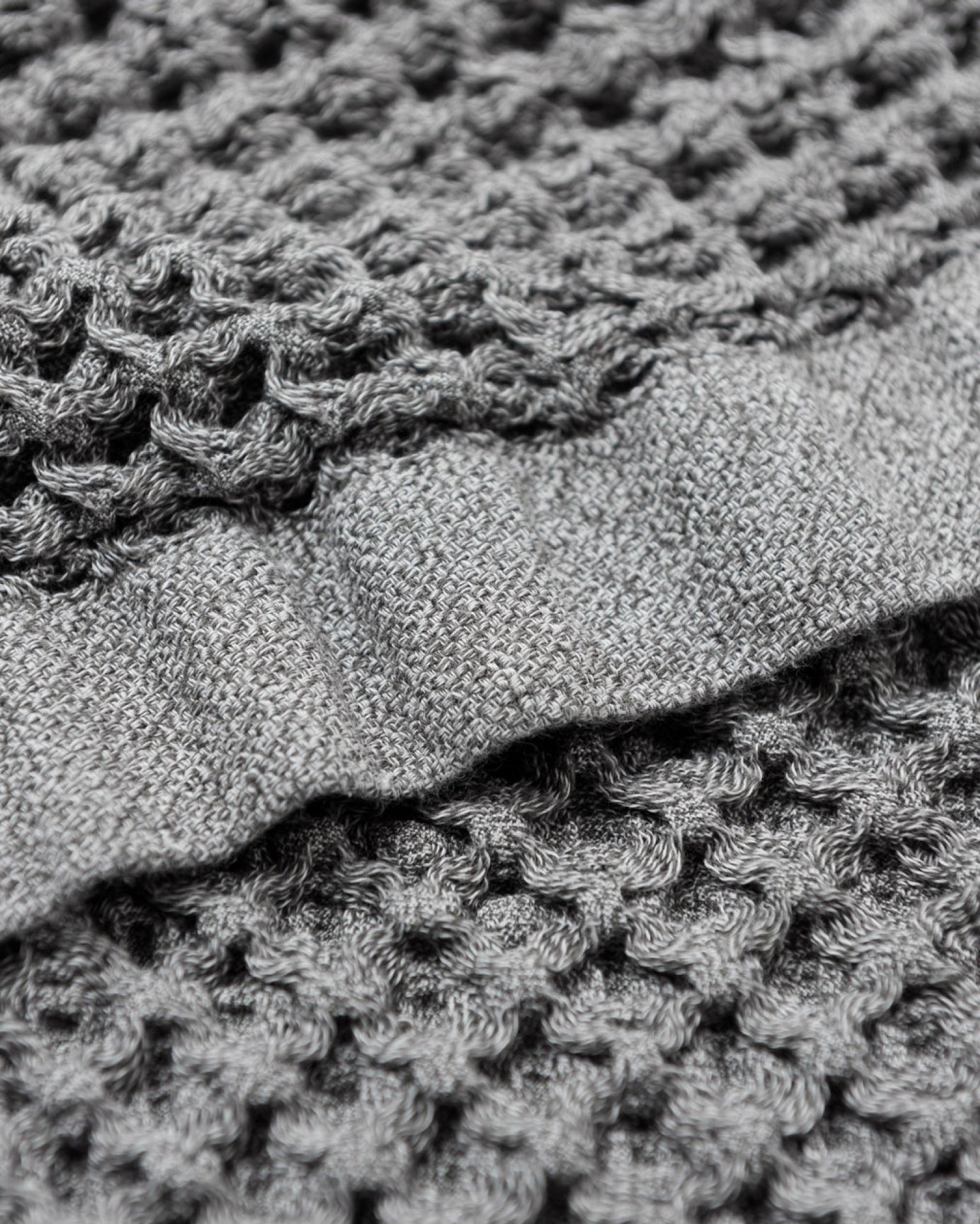 Close up of the Onsen Waffle Towel in Cinder Grey #color_cinder-grey