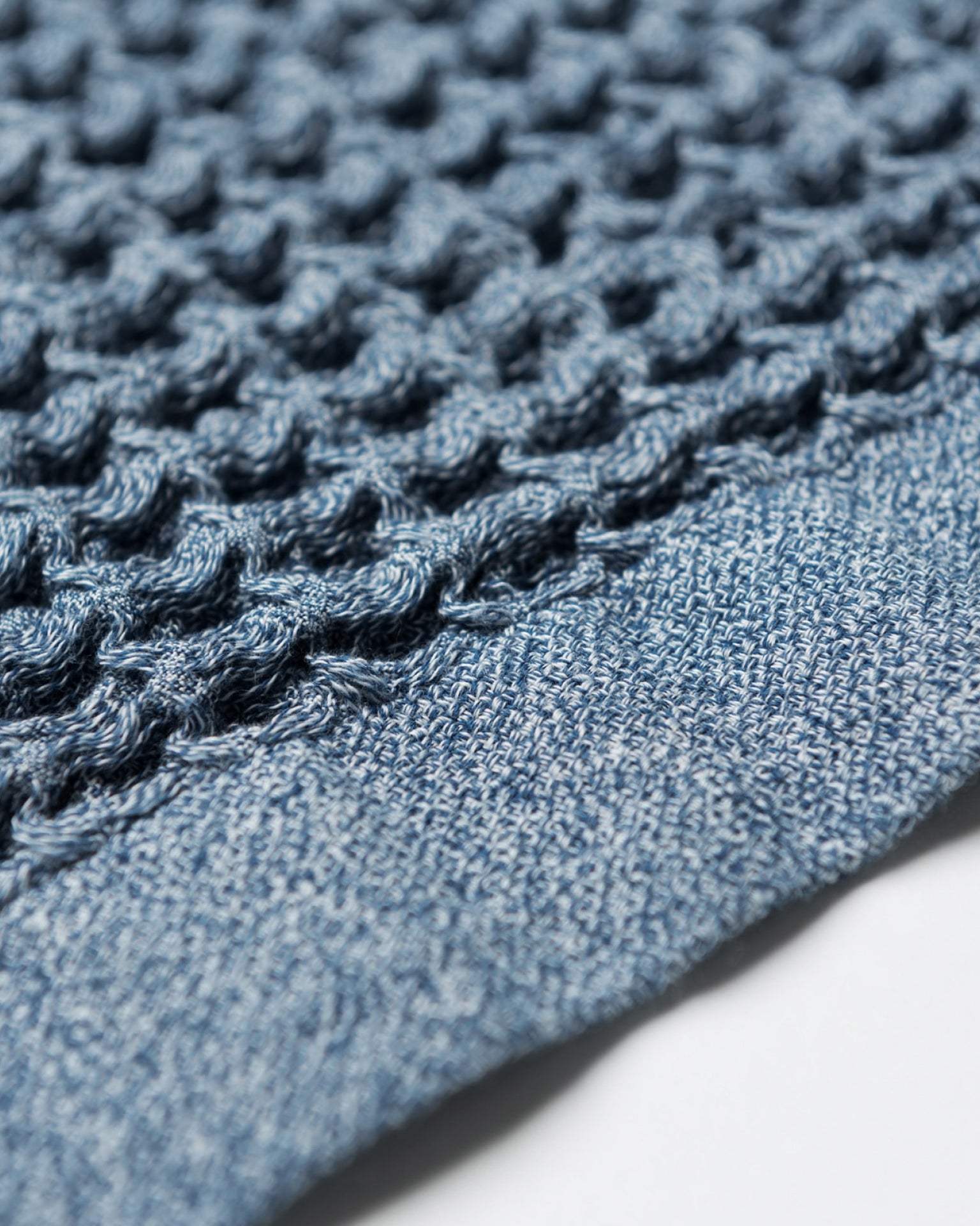 Close up of the Onsen Waffle Towel in Denim #color_denim