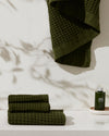 The ONSEN Forest Waffle Complete Towel Set in a bathroom setting..