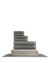 Supima waffle complete bathroom bundle featuring stacked towels and bath mat in coordinating gray colors.