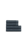 Supima® Waffle 4pc Bath Towel Bundle featuring ultra-absorbent Bath Towels stacked neatly.