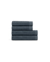 Black rubber stopper on a white background