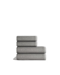 Sculpted Terry 4pc Towel Bundle stacked in grey, featuring 2 bath towels and 2 hand towels for ultimate comfort.