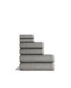 Sculpted Terry 6pc Towel Bundle displayed in a stacked arrangement showcasing plush texture and modern design.