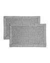 A waffle bath mat with a textured weave pattern.