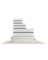 Supima waffle complete bathroom bundle featuring stacked towels and a bath mat for a coordinated bathroom decor.