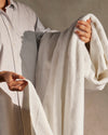 A woman holding the Onsen Plush Bath Towel 