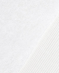 A close-up image of the ONSEN White Plush Towel. 