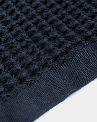 A close-up image of the ONSEN Twilight Blue Waffle Towel.
