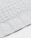 A close-up image of the ONSEN White Waffle Towel.