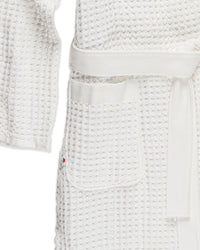 A close-up image of the ONSEN White Waffle Bath Robe.