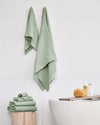 The ONSEN Sage Waffle Bath Towel Set in a bathroom setting.