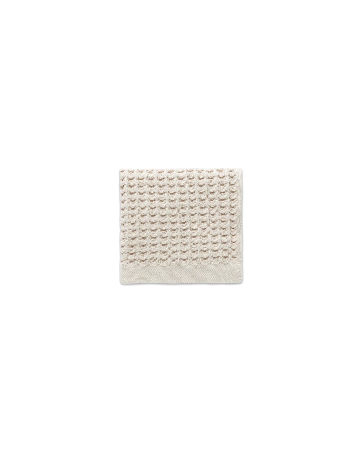 The ONSEN Oatmeal Waffle Face Towel on a white background.