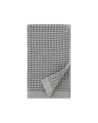 The ONSEN Cinder Grey Waffle Hand Towel on a white background.
