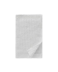 The ONSEN White Waffle Hand Towel on a white bacground.