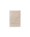 The ONSEN Oatmeal Plush Hand Towel on a white background. 